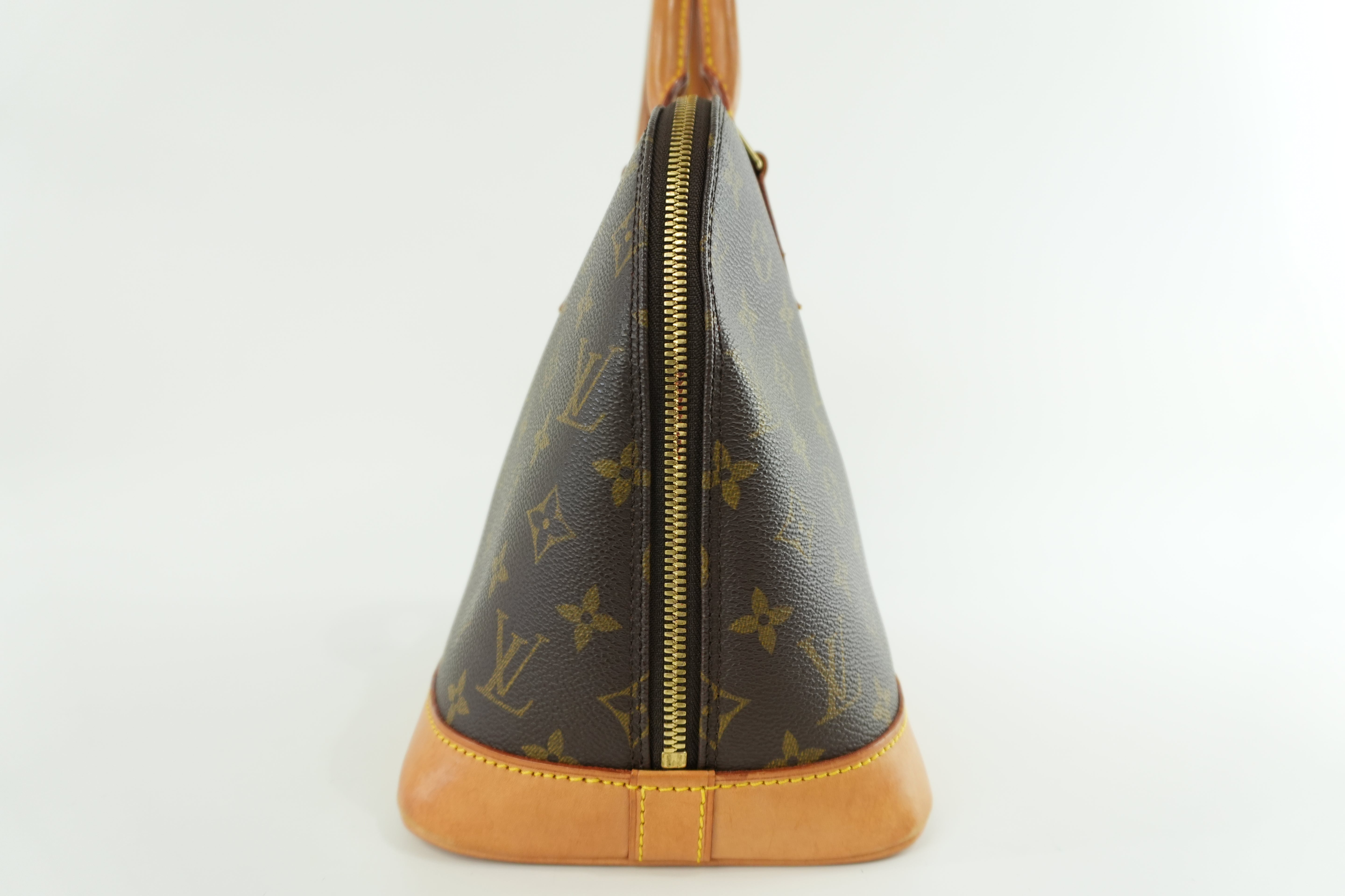 Louis Vuitton Monogram Alma PM Handbag Used