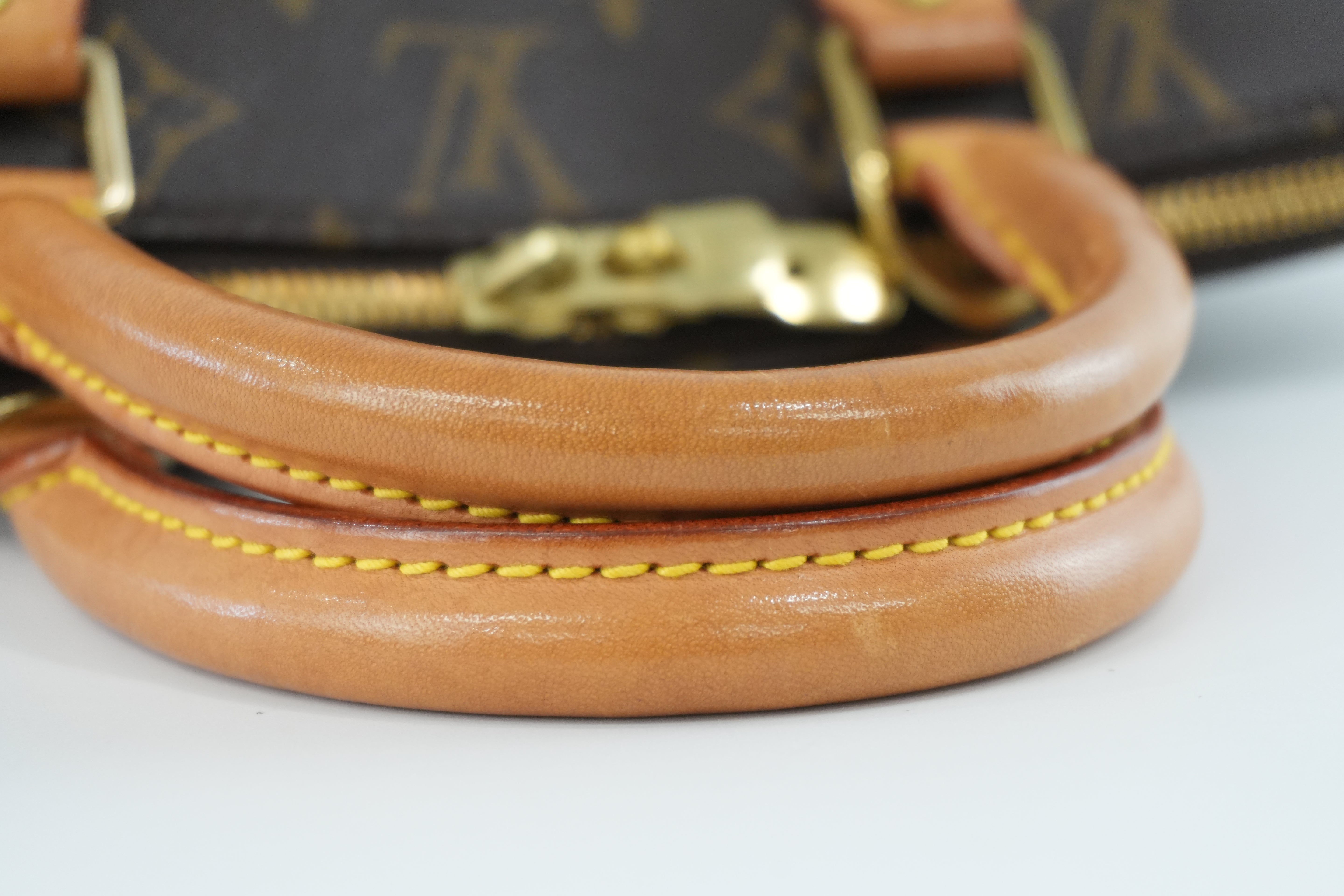 Louis Vuitton Monogram Alma PM Handbag Used