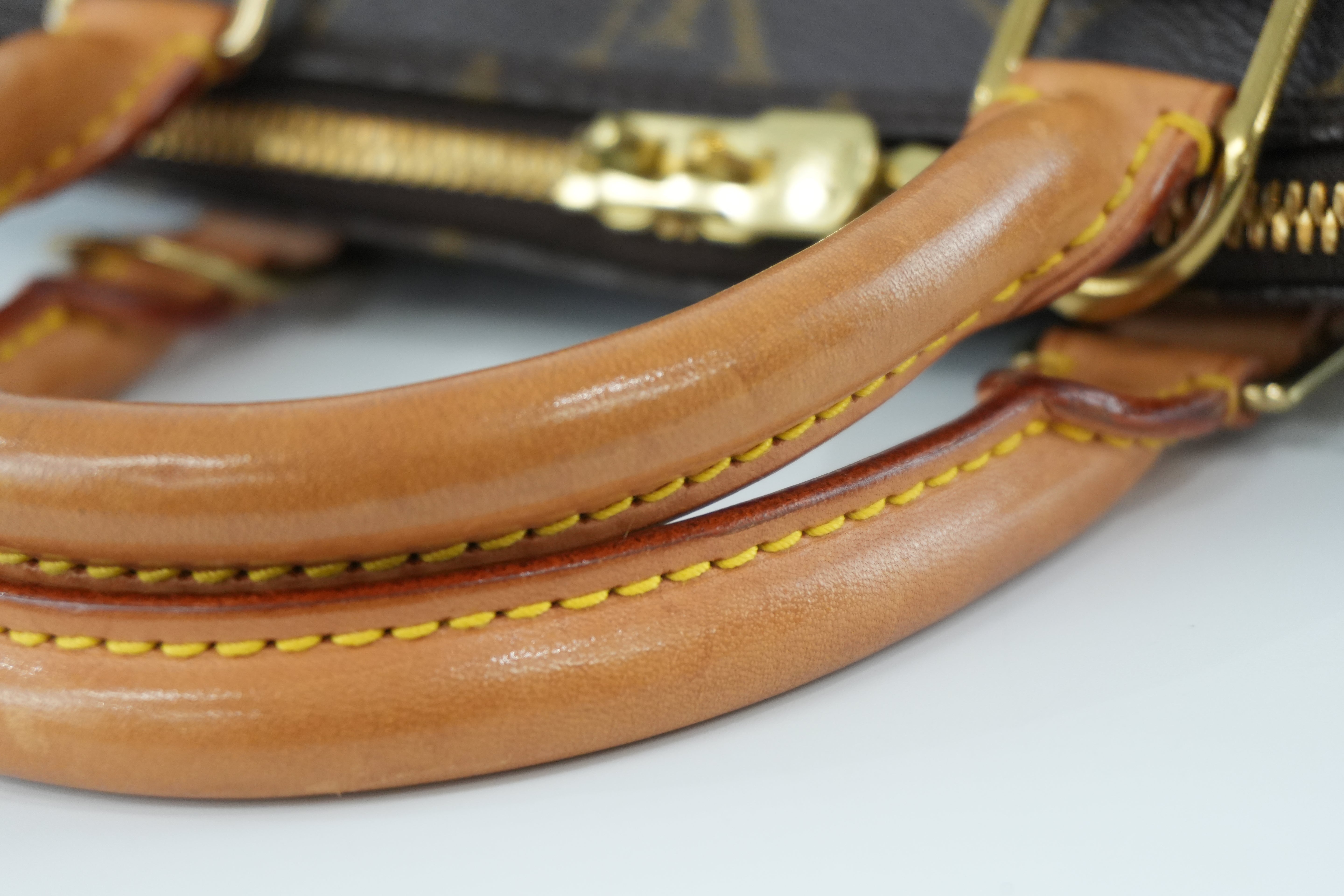 Louis Vuitton Monogram Alma PM Handbag Used