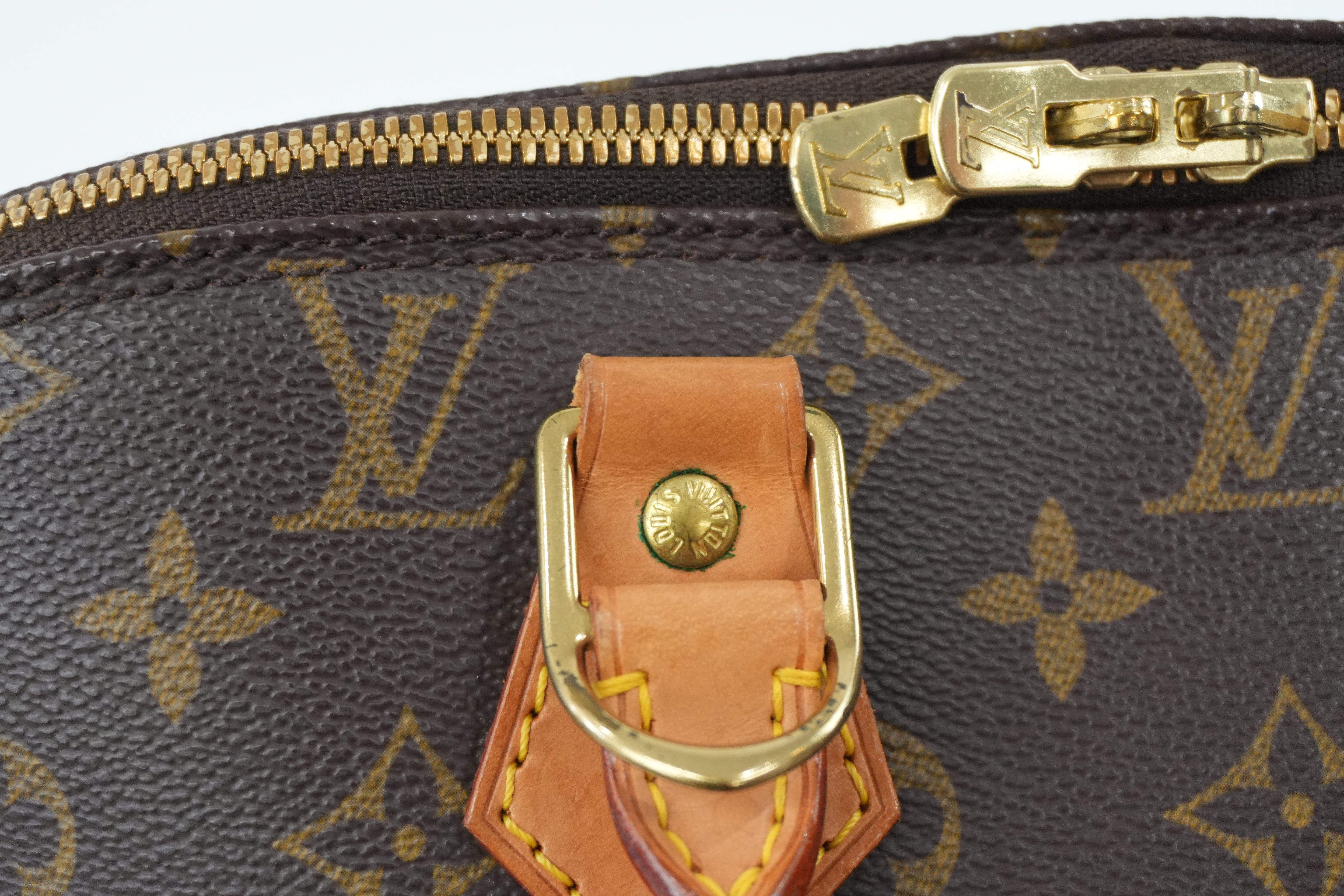 Louis Vuitton Monogram Alma PM Handbag Used
