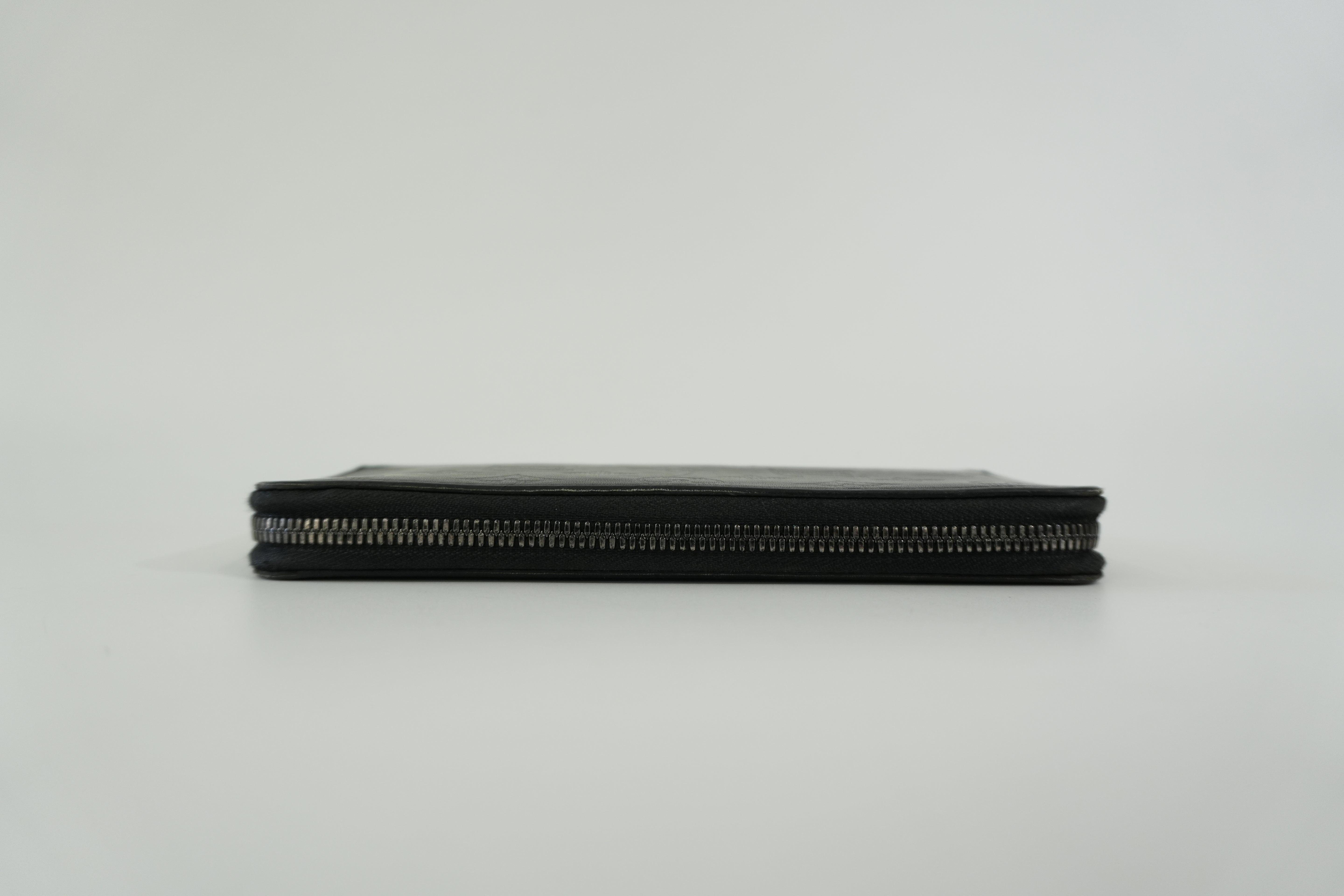 Pre-owned Louis Vuitton Shadow Monogram Vertical Zippy Wallet Black