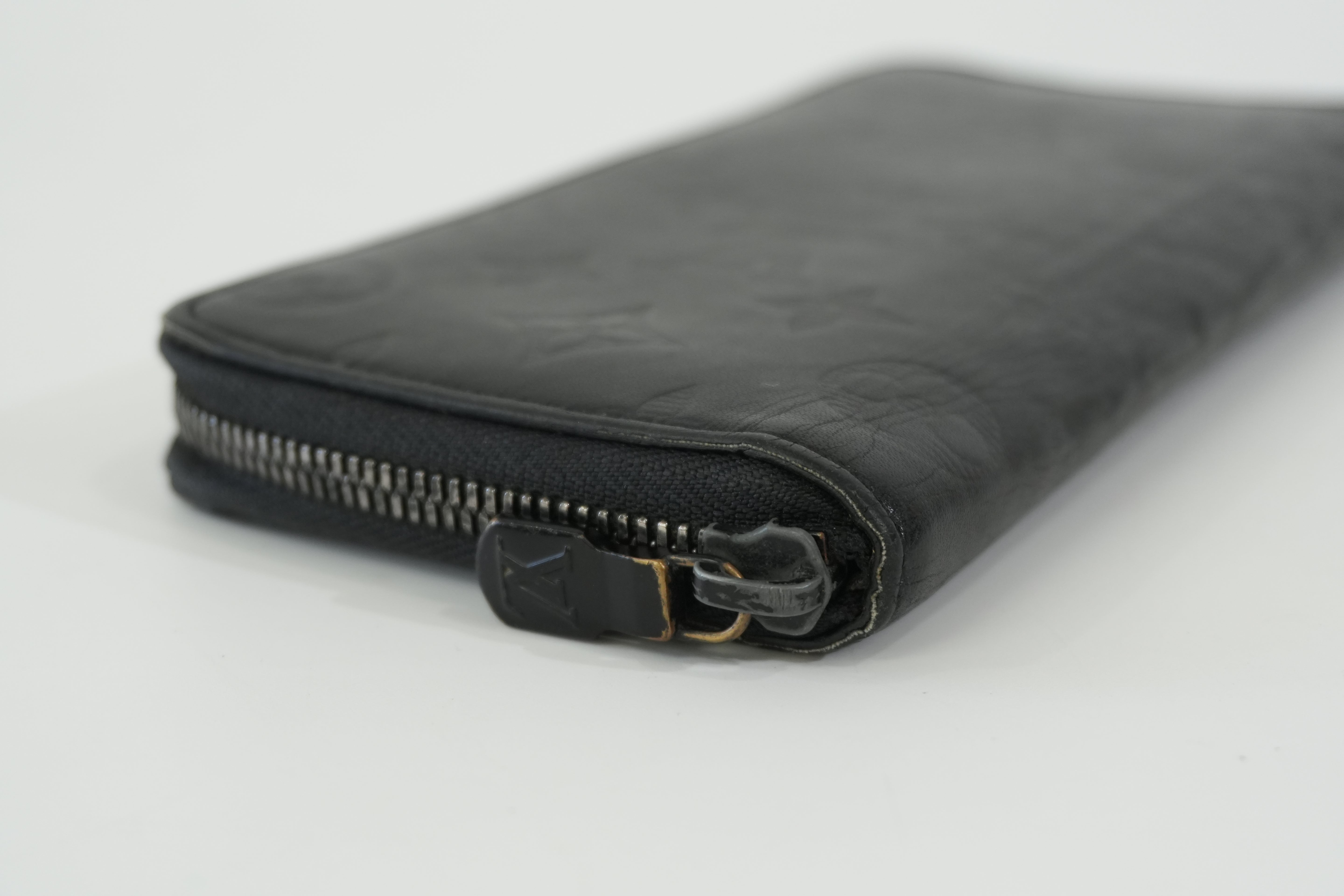 Pre-owned Louis Vuitton Shadow Monogram Vertical Zippy Wallet Black