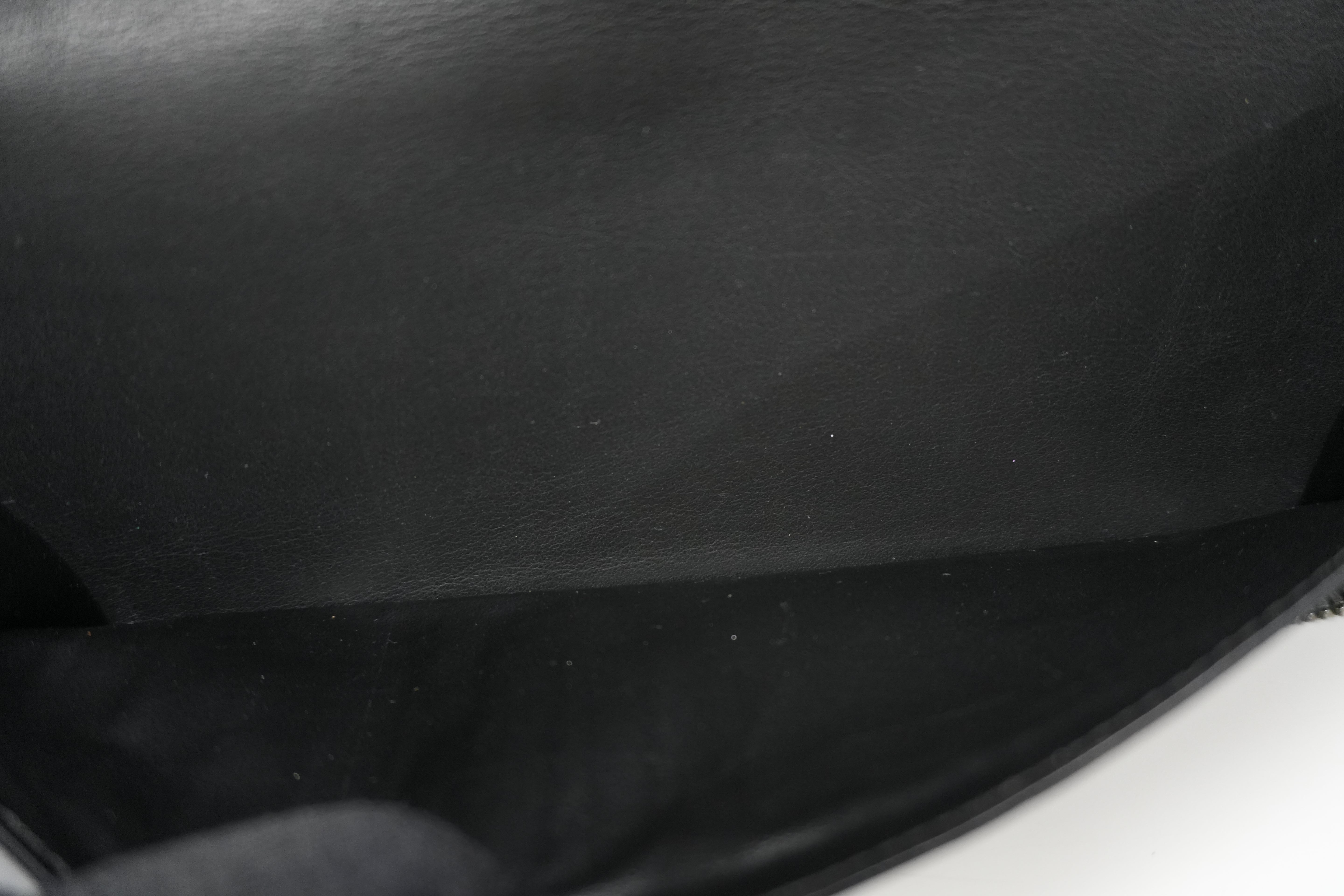 Pre-owned Louis Vuitton Shadow Monogram Vertical Zippy Wallet Black