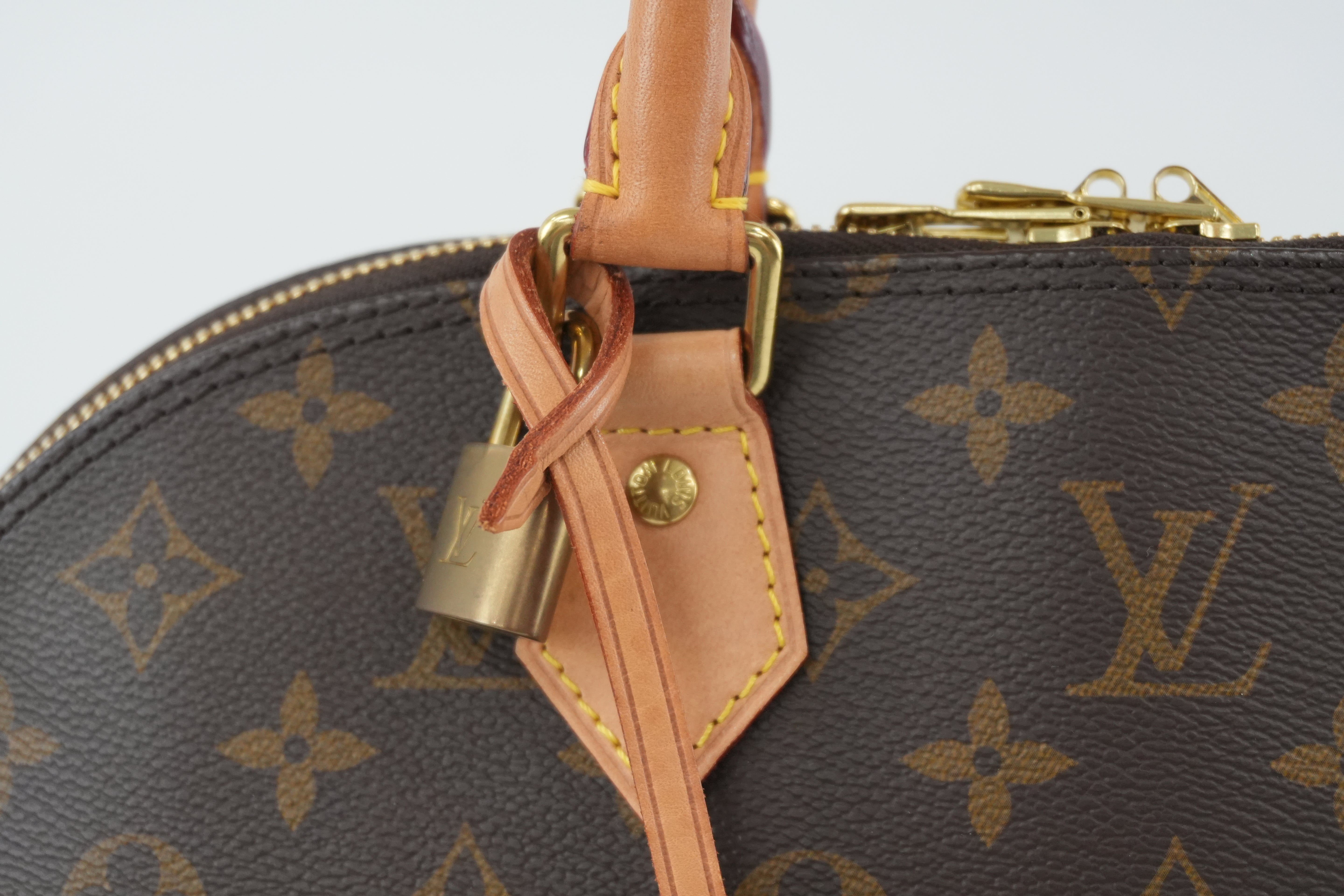 Louis Vuitton Monogram Alma PM Handbag Used