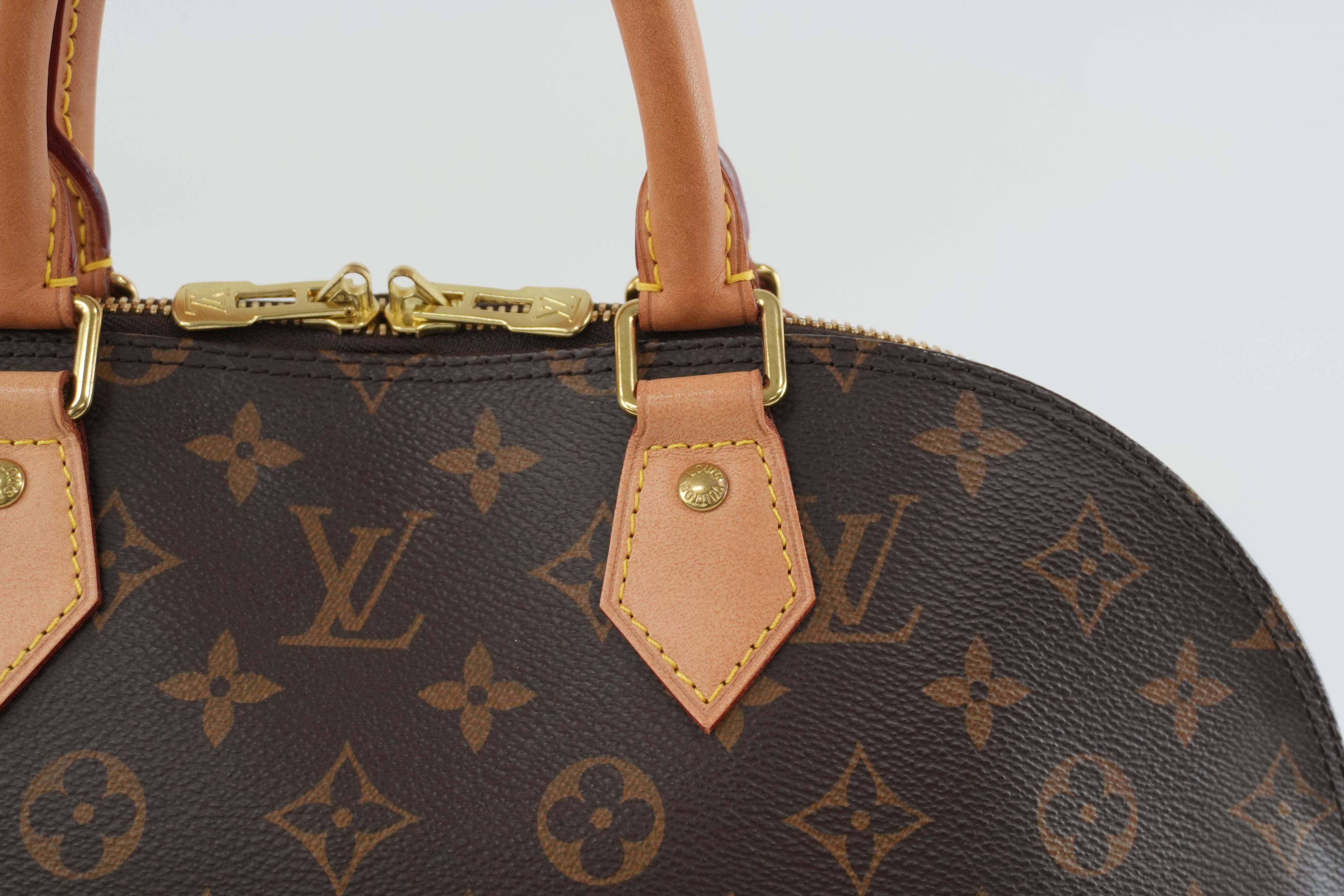 Louis Vuitton Monogram Alma PM Handbag Used