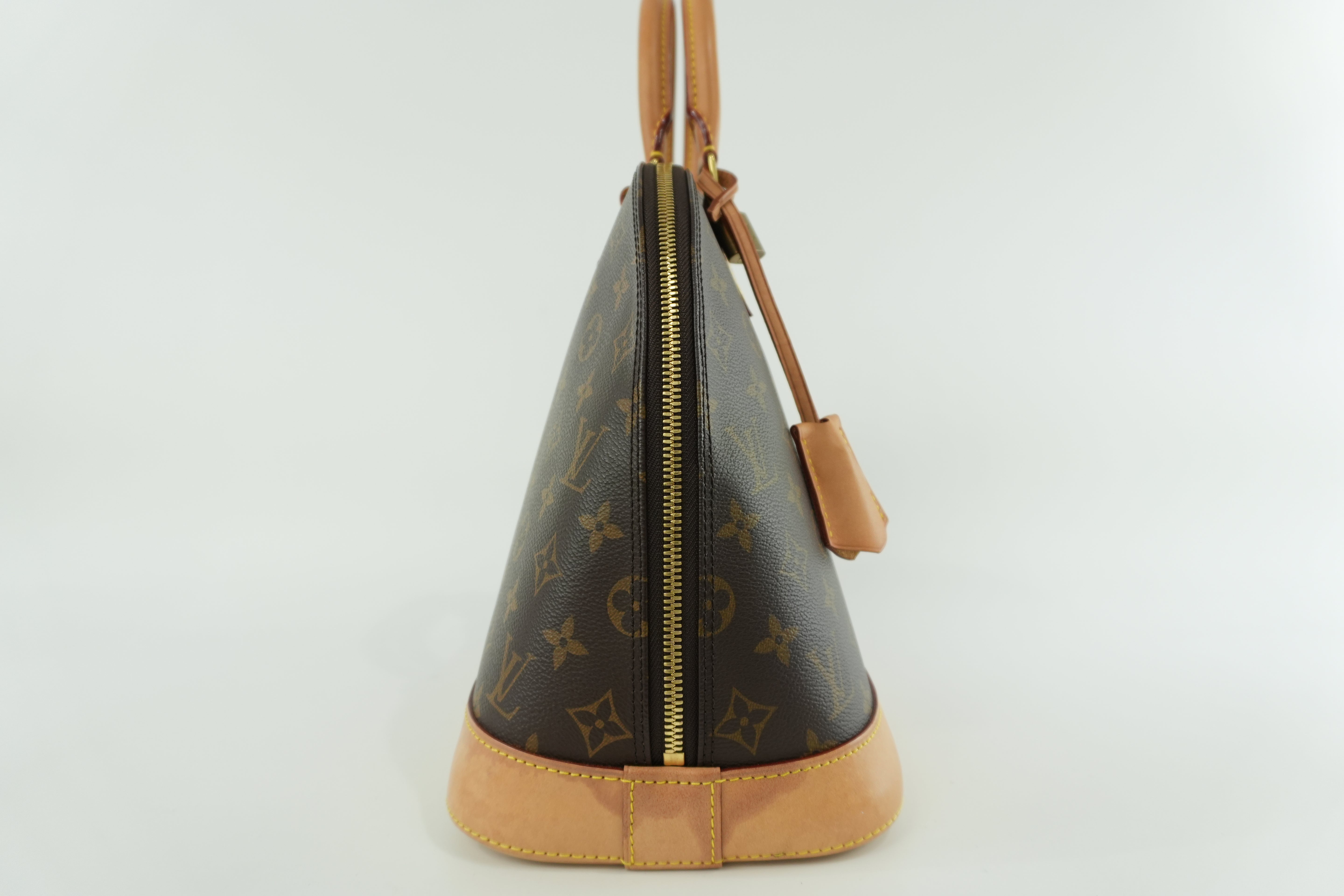 Louis Vuitton Monogram Alma PM Handbag Used