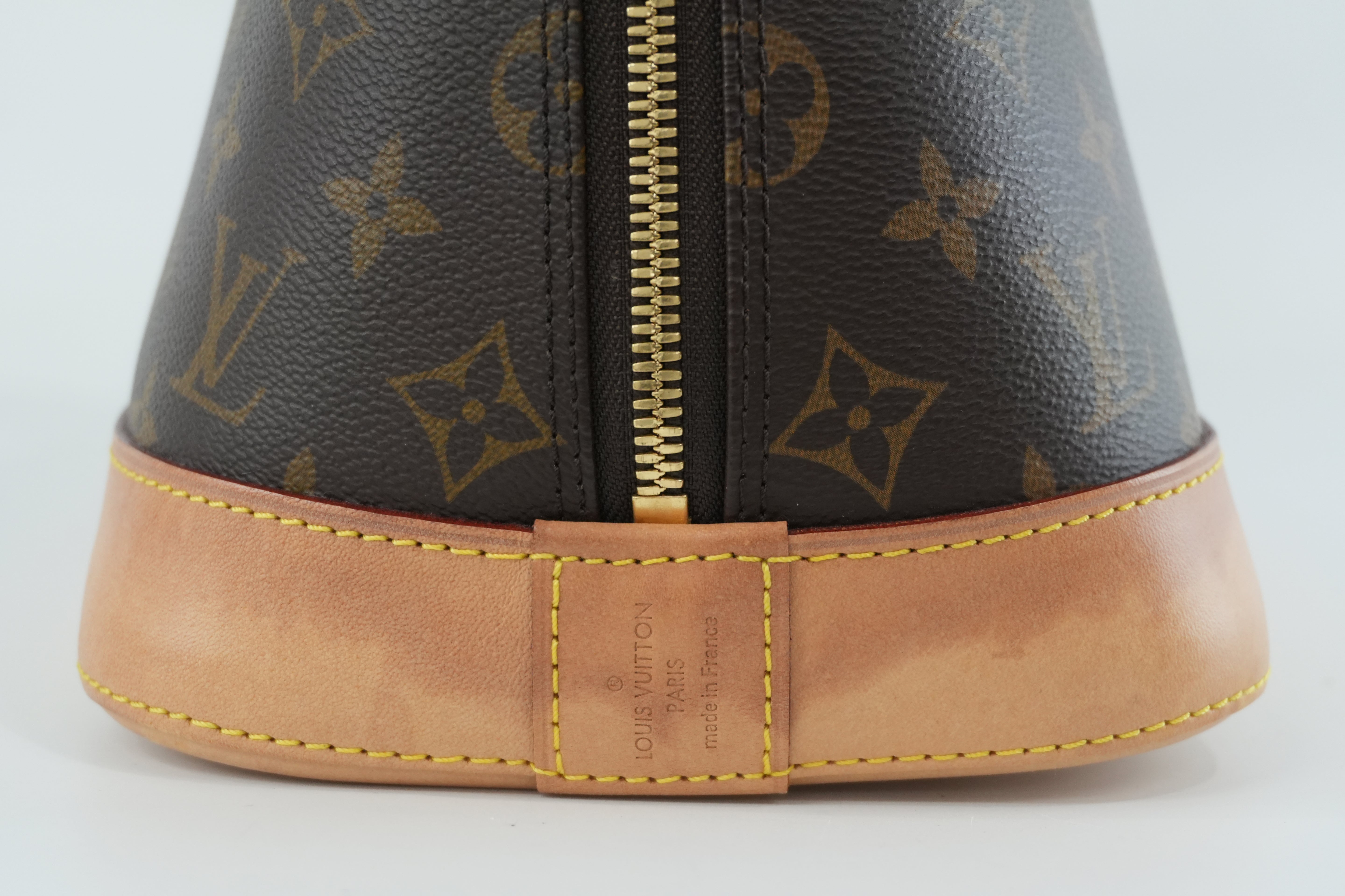 Louis Vuitton Monogram Alma PM Handbag Used