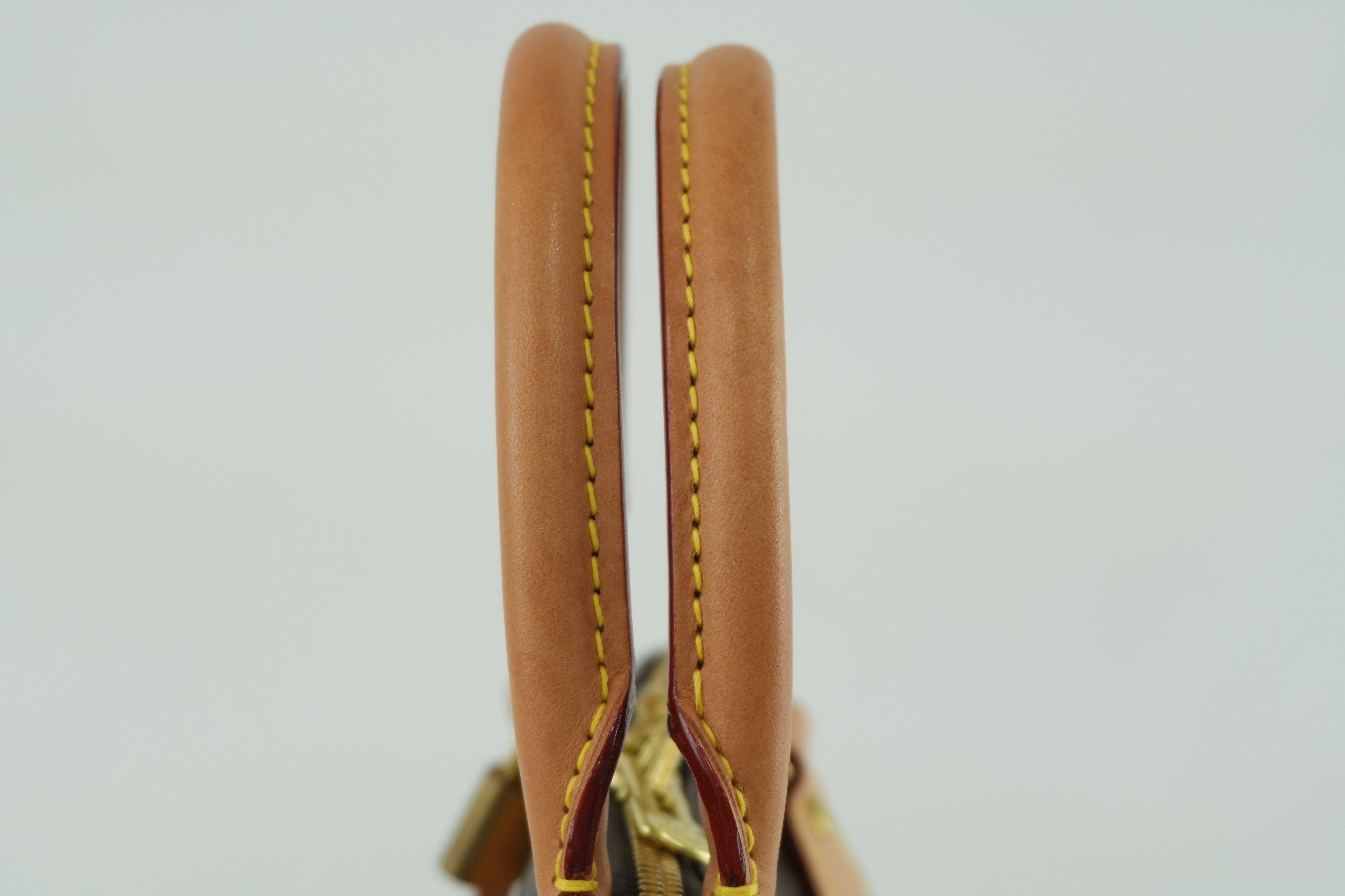 Louis Vuitton Monogram Alma PM Handbag Used