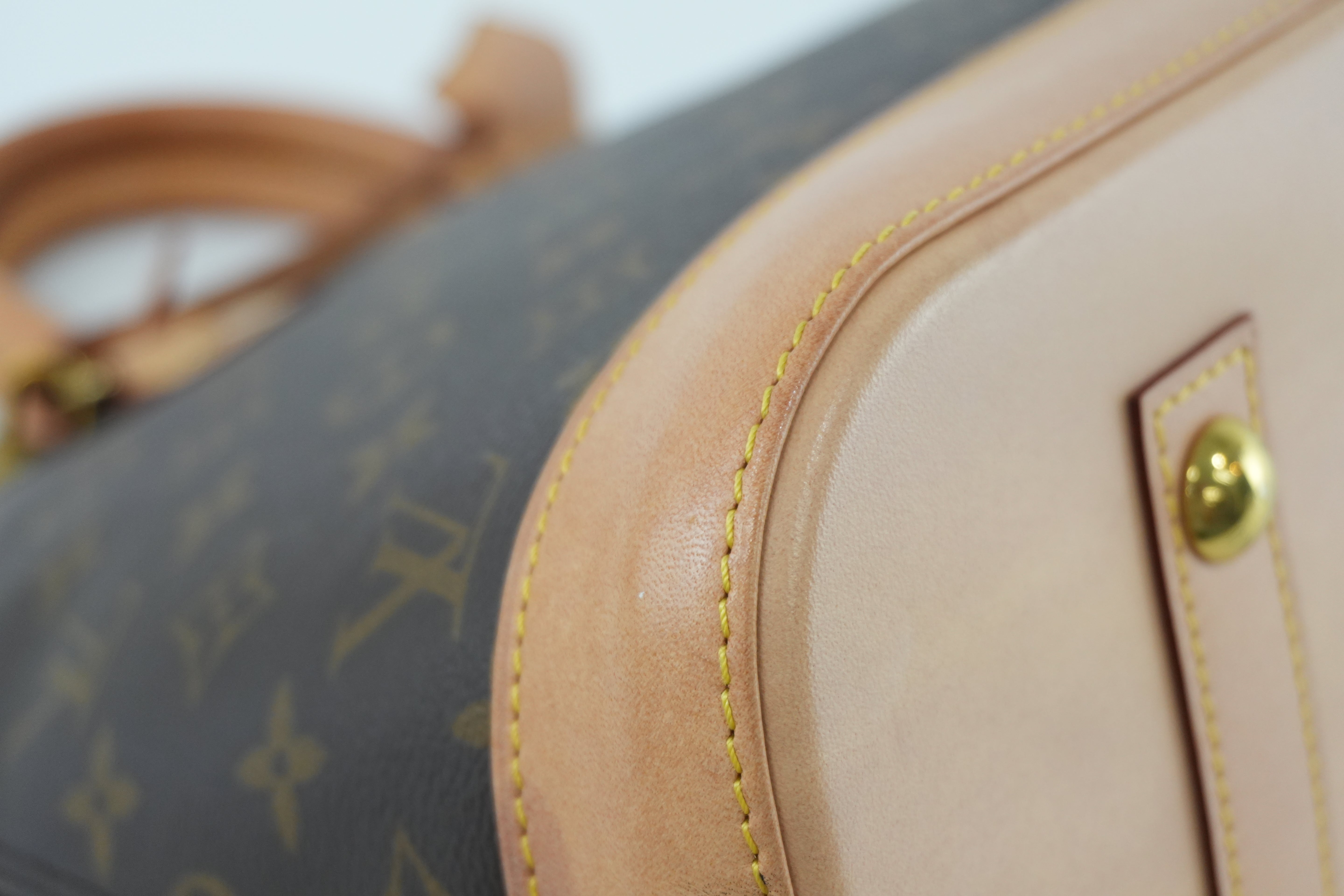 Louis Vuitton Monogram Alma PM Handbag Used