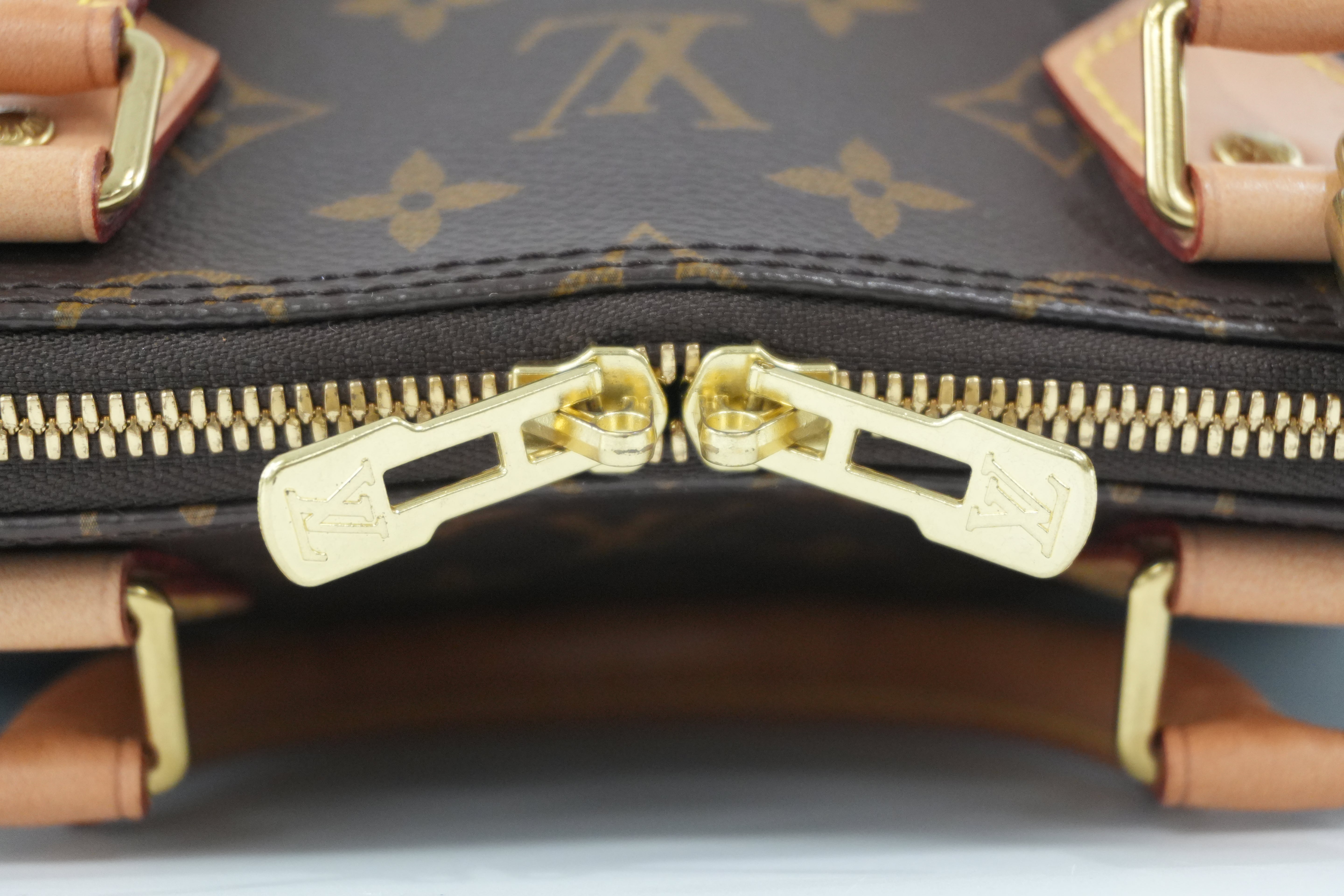 Louis Vuitton Monogram Alma PM Handbag Used