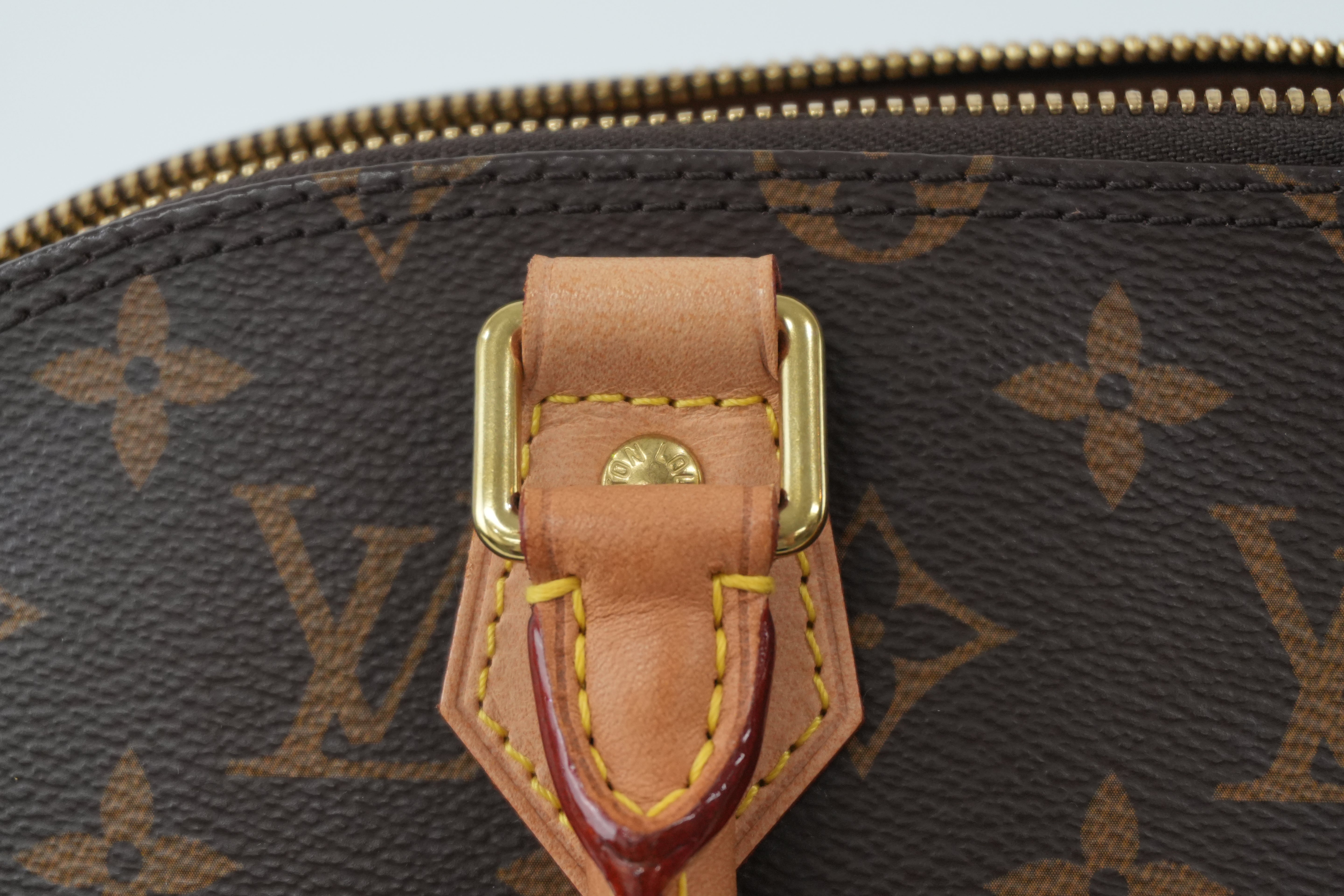 Louis Vuitton Monogram Alma PM Handbag Used