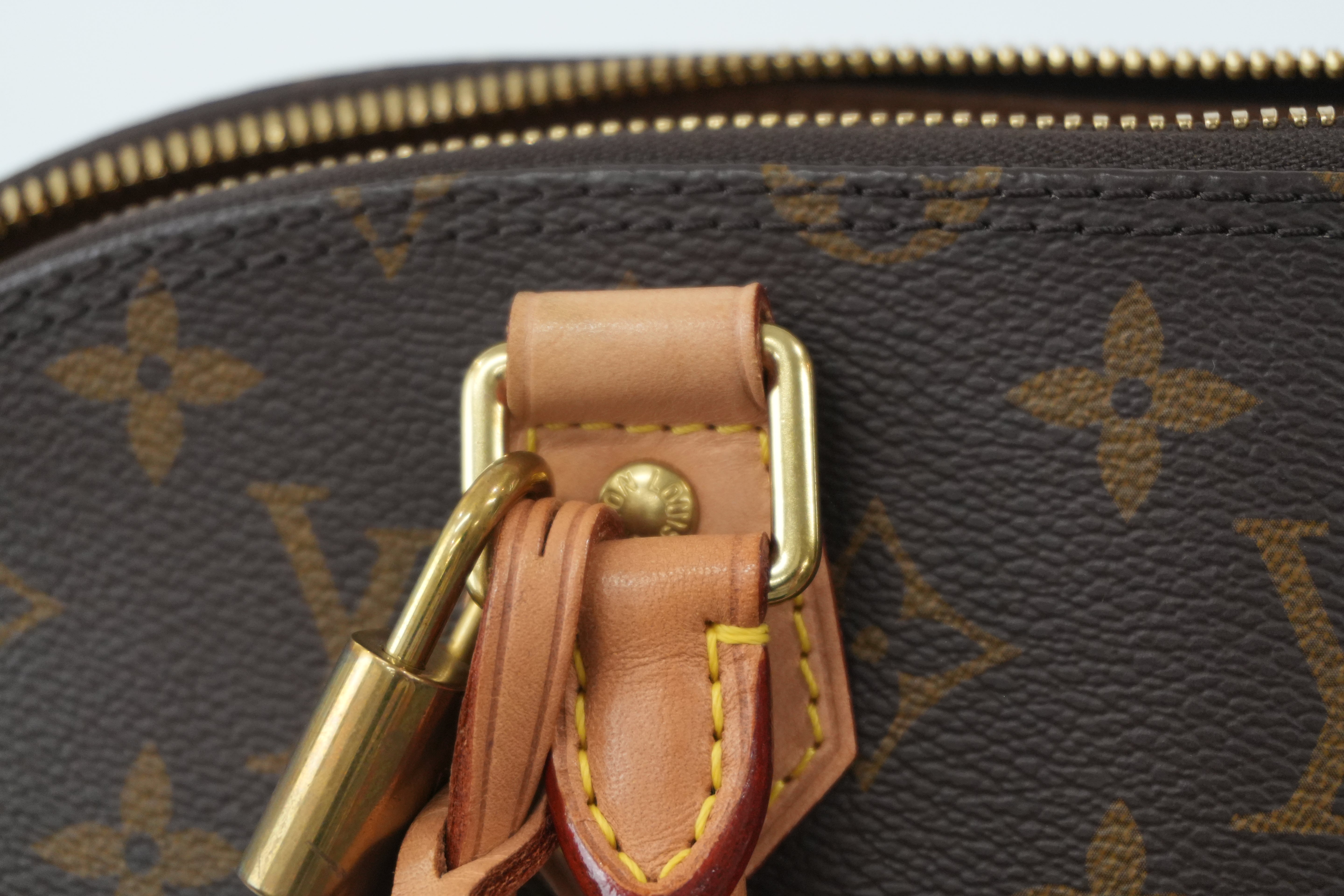 Louis Vuitton Monogram Alma PM Handbag Used