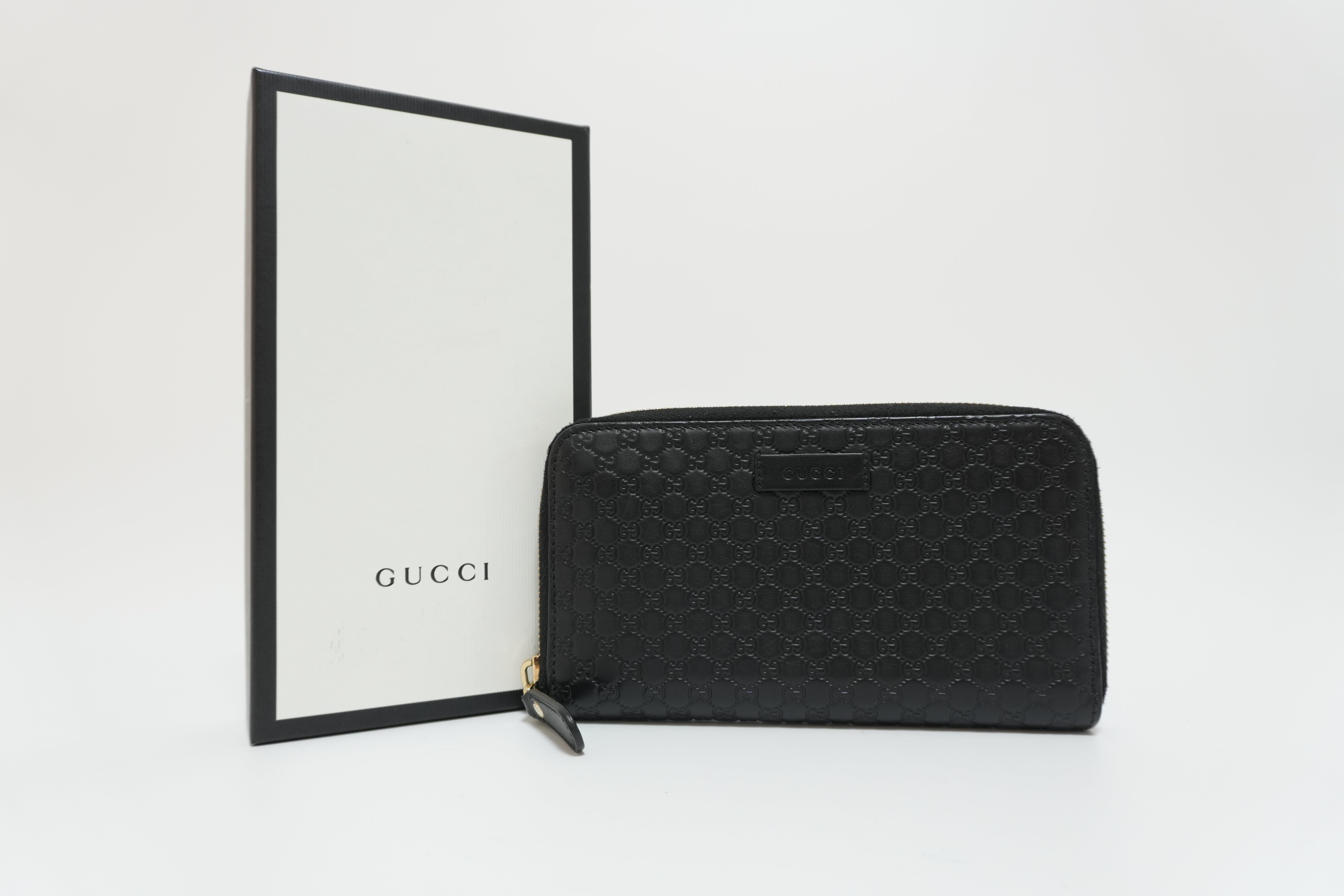Gucci Micro Guccisima Zippy Wallet Black Leather Used