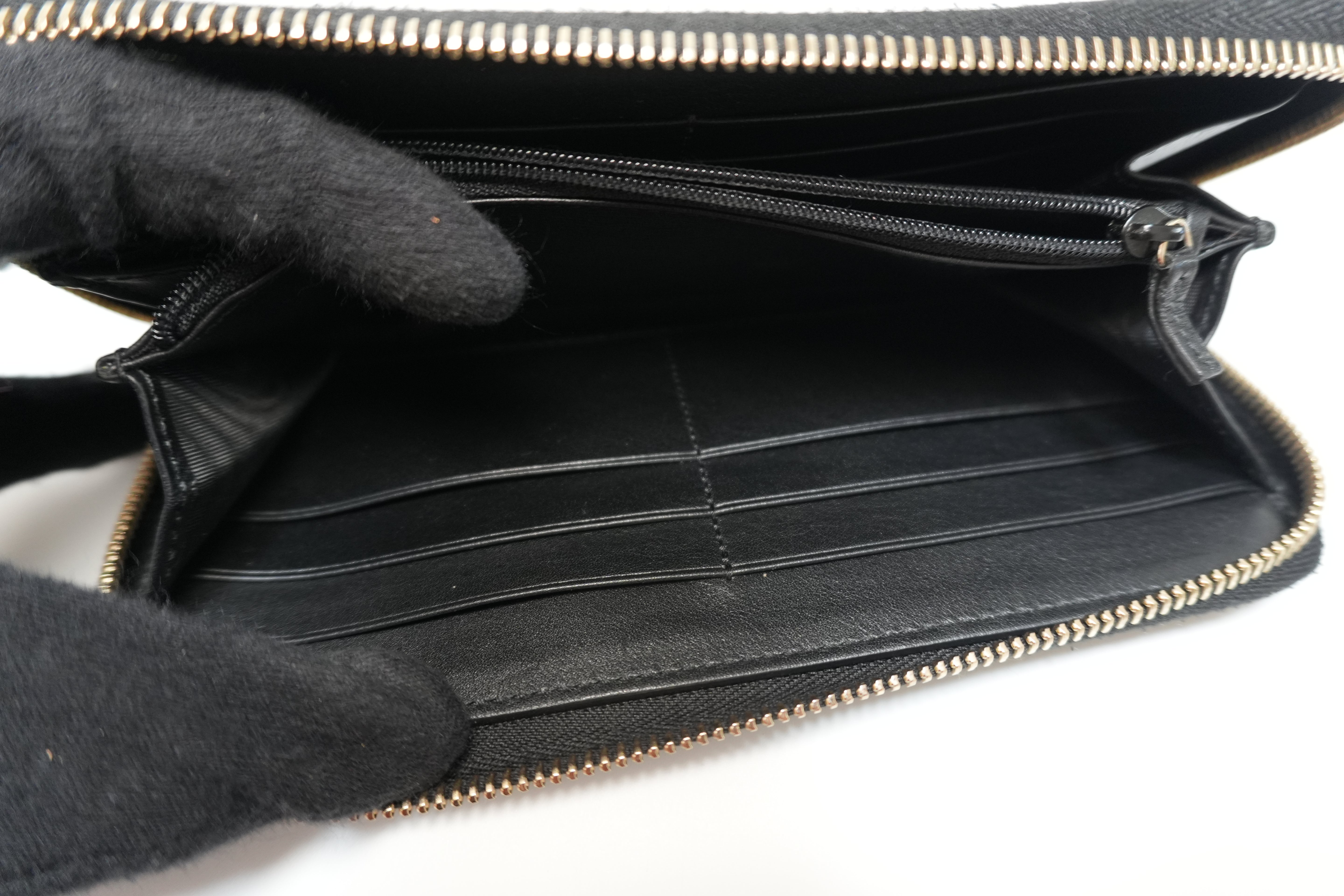 Gucci Micro Guccisima Zippy Wallet Black Leather Used