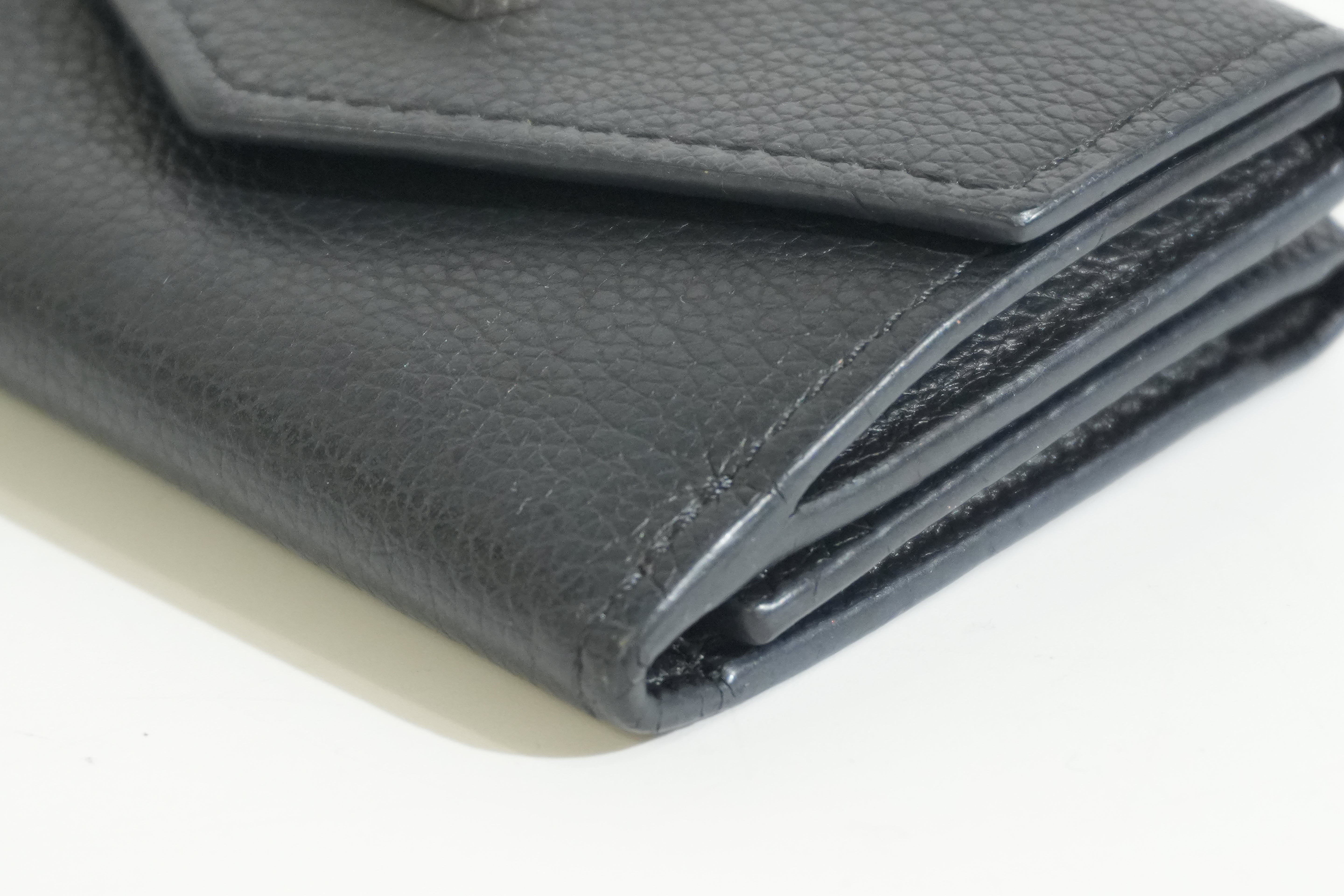 Pre-owned Louis Vuitton Leather Lock Mini Wallet Black