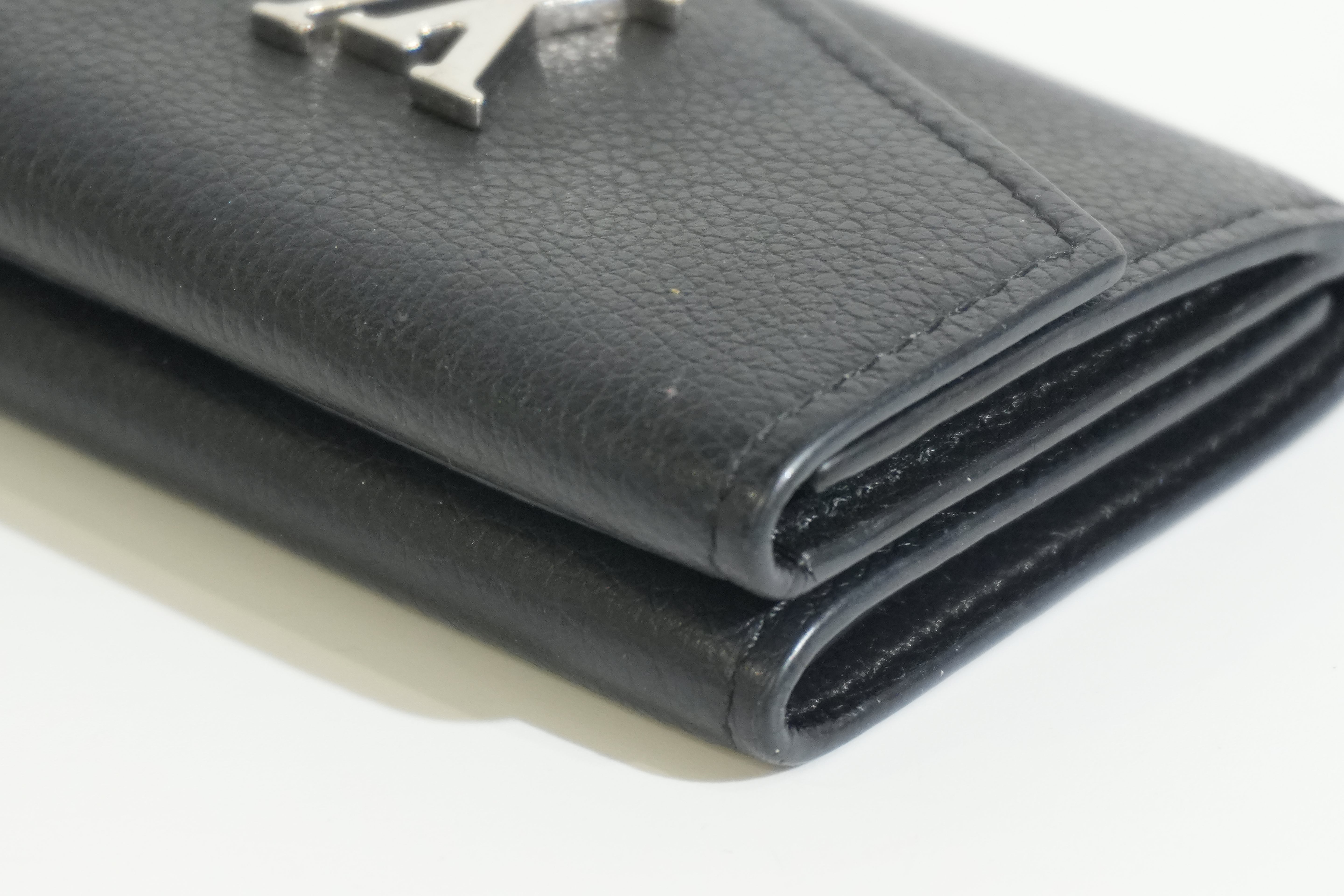 Pre-owned Louis Vuitton Leather Lock Mini Wallet Black