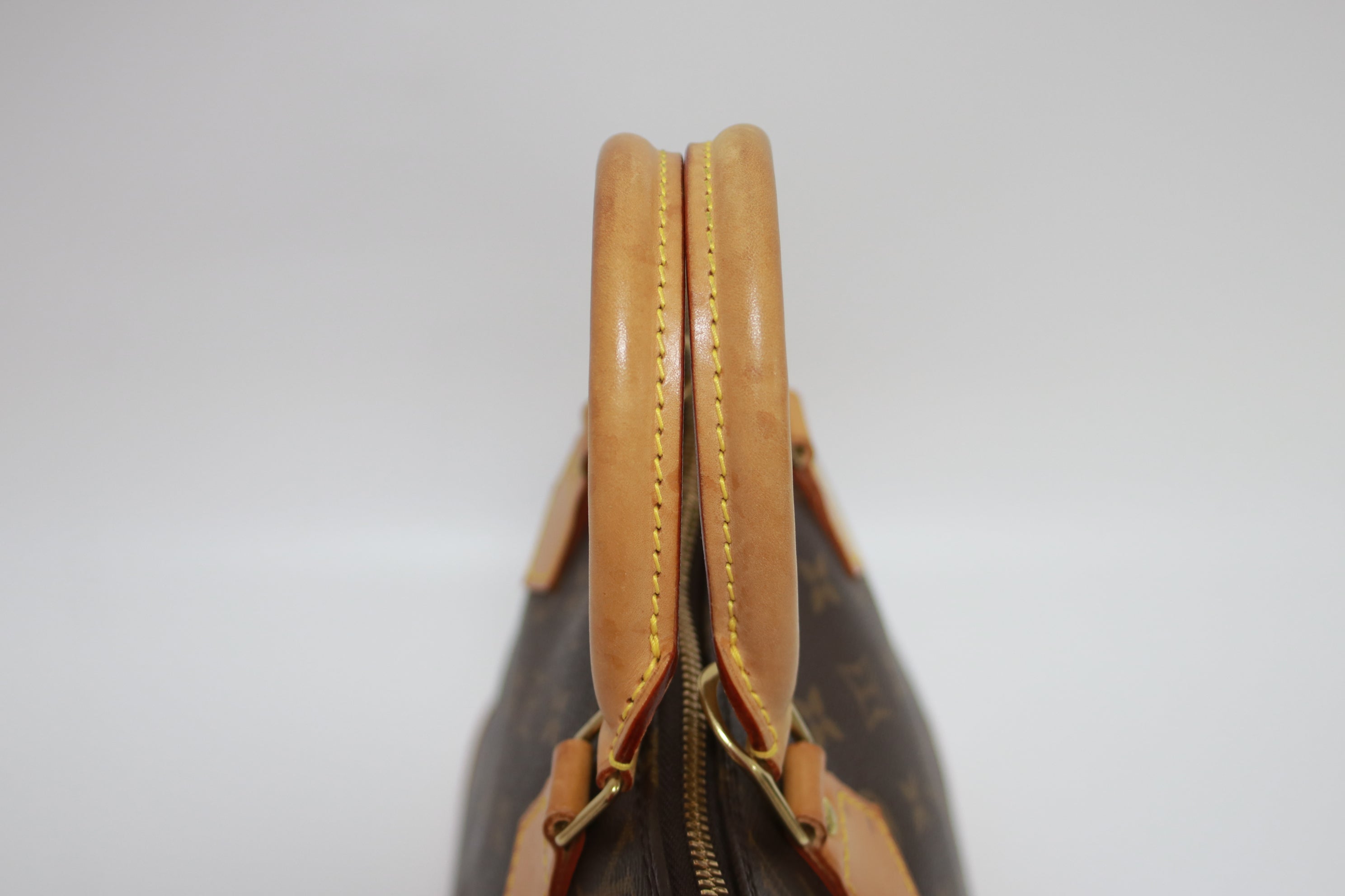 Louis Vuitton Alma PM Handbag Used