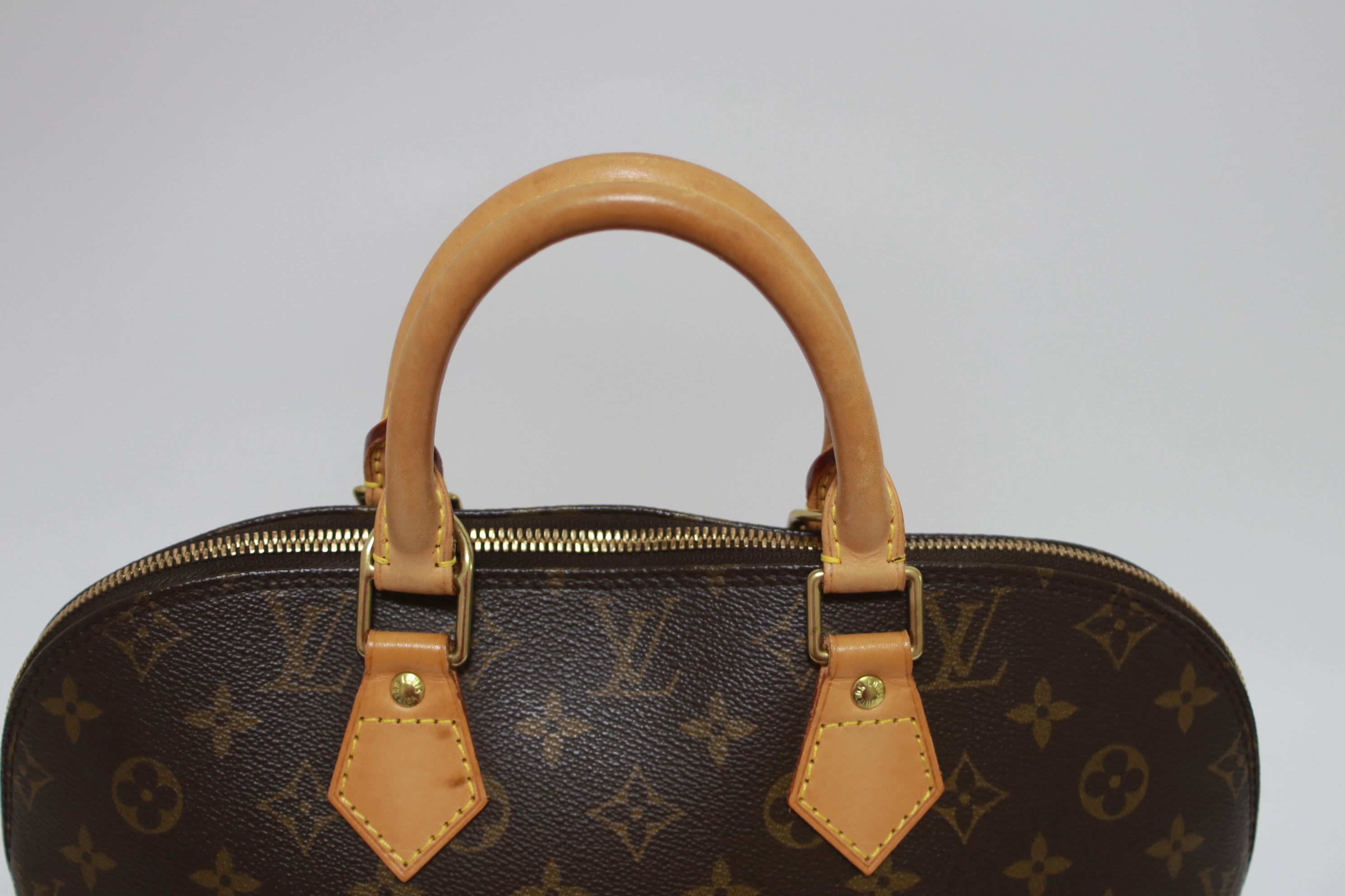 Louis Vuitton Alma PM Handbag Used